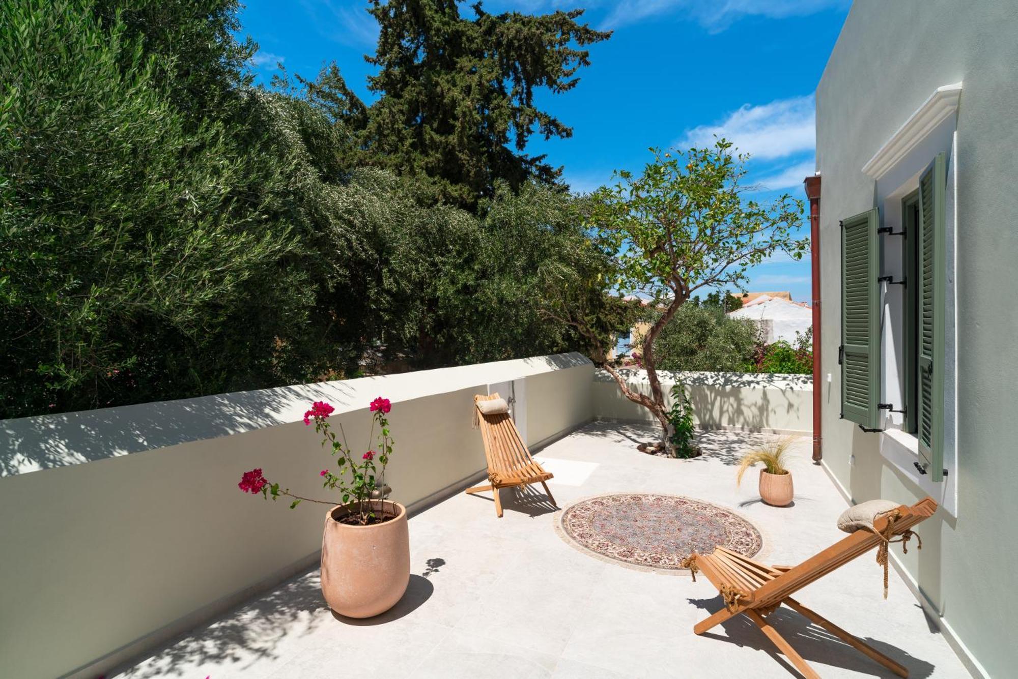 Nisomar Suites Sými Esterno foto